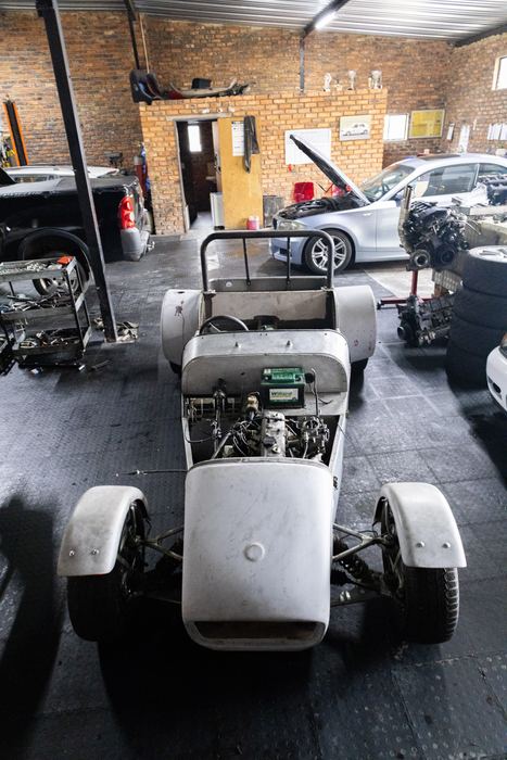 The kit car rolling chassis with engine fitted