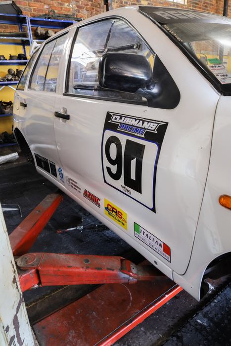 The #90 Clubmans race car on the lift