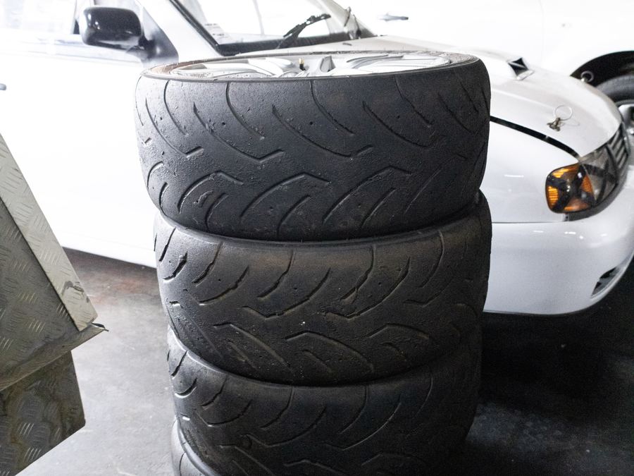 A stack of tyres in the CRS Auto workshop